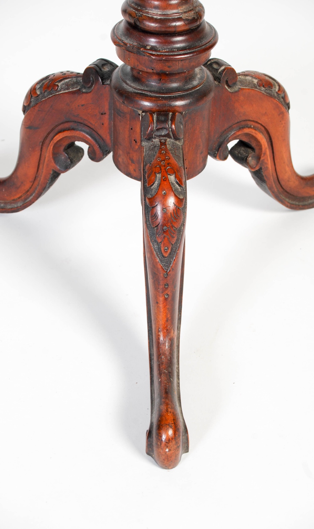 A 19th century walnut occasional table, the circular top with foliate carved edge on a tapered - Image 5 of 8