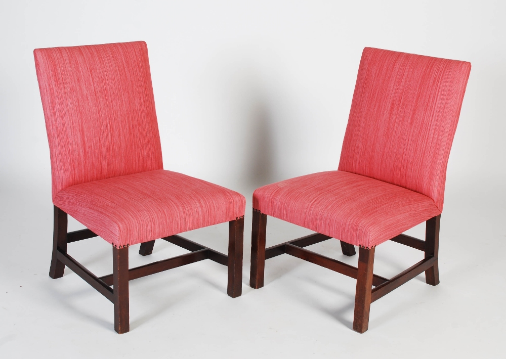 A pair of 19th century mahogany side chairs, the upholstered backs and seats with studded details