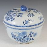 A Chinese blue and white porcelain circular tureen and cover, Qing Dynasty, decorated with peony and