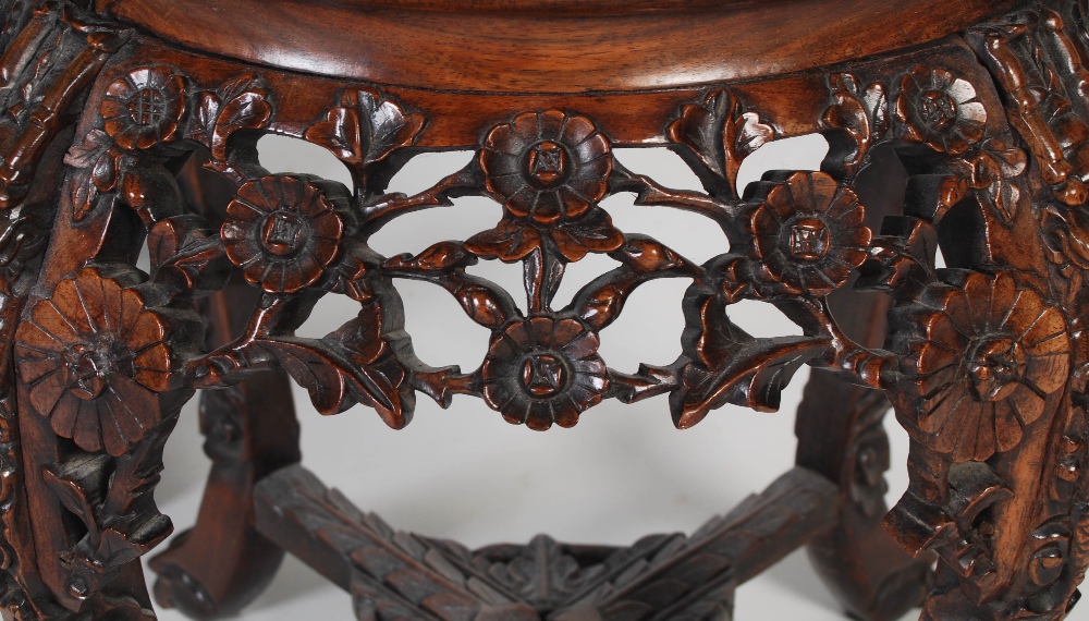 A pair of Chinese darkwood jardiniere stands, Qing Dynasty, the circular tops with marble inserts - Image 4 of 7