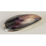 A late 19th century mussel shell snuff box, with silvered-brass mounts and three-quarter opening