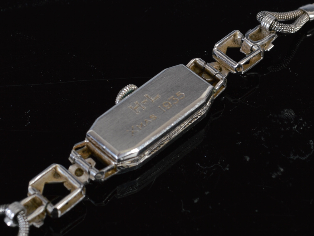 An Art Deco white metal and diamond set cocktail watch, the rectangular dial with Arabic numerals, - Image 3 of 3