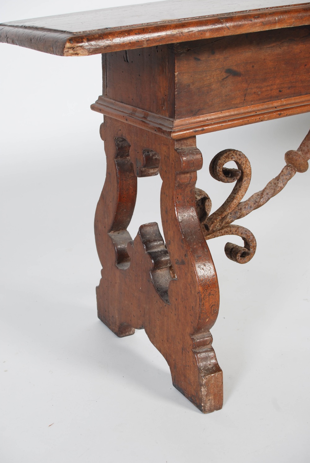 A Spanish walnut bench, probably 17th century and later, the rectangular planked top with moulded - Image 4 of 5