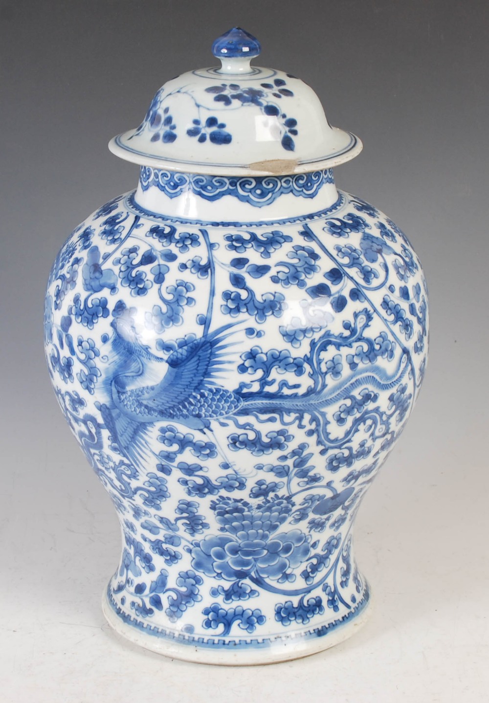 A Chinese porcelain blue and white jar and cover, Qing Dynasty, decorated with phoenix, peony and - Image 3 of 12