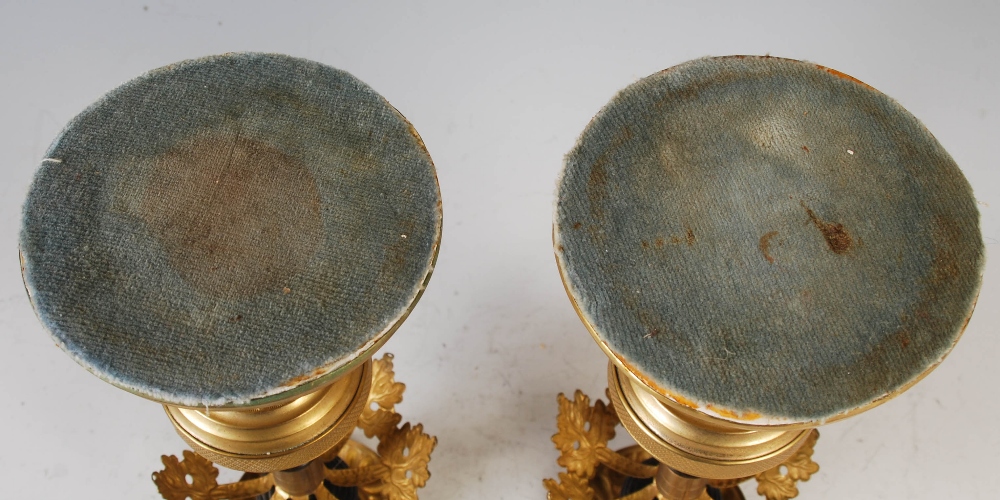 A pair of 19th century Regency style gilt metal candlesticks, with foliate cast canopy to suspend - Image 6 of 6