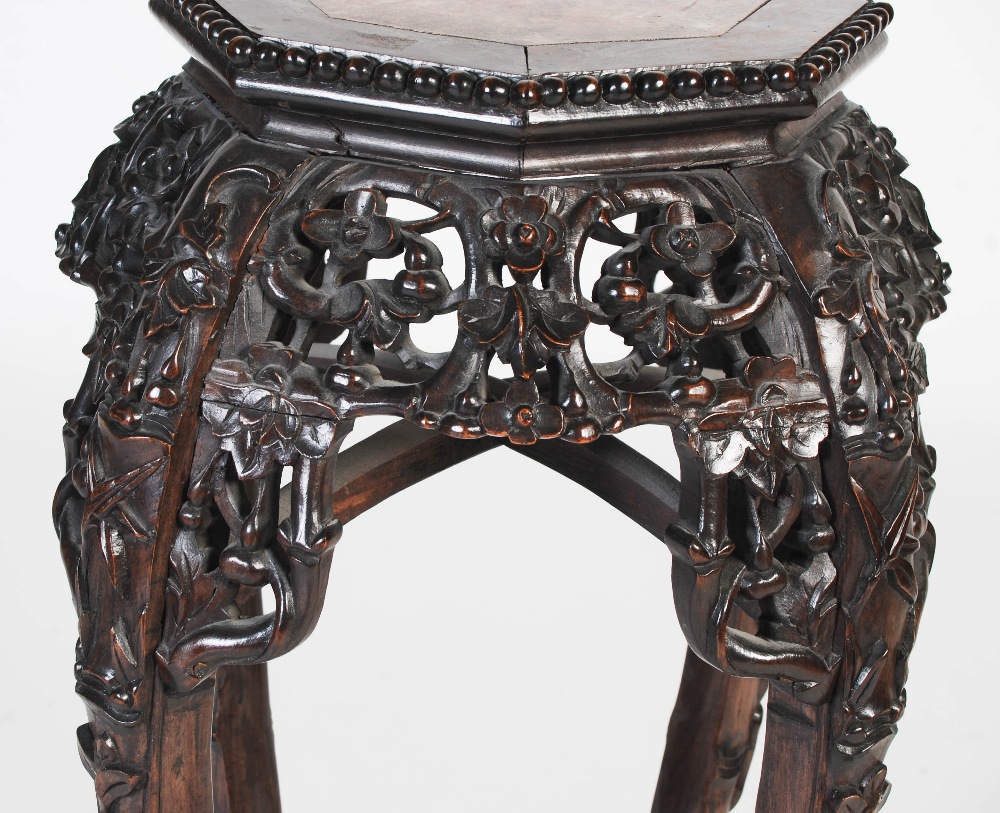 A Chinese darkwood jardiniere stand, Qing Dynasty, the octagonal top with a marble insert above a - Image 3 of 6