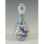 A Chinese blue and white wucai porcelain bottle vase, bearing six character Kangxi mark but later,