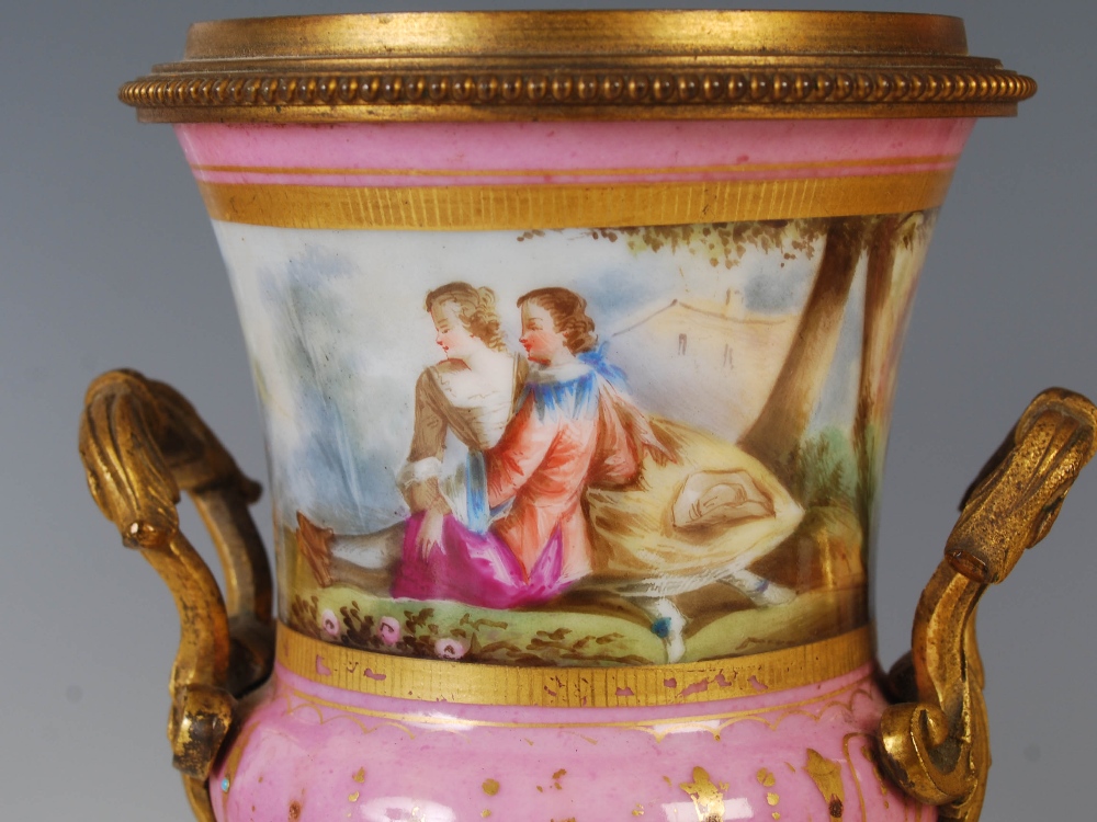 A 19th century ormolu and pink ground porcelain mounted clock garniture, the porcelain dial - Image 9 of 9