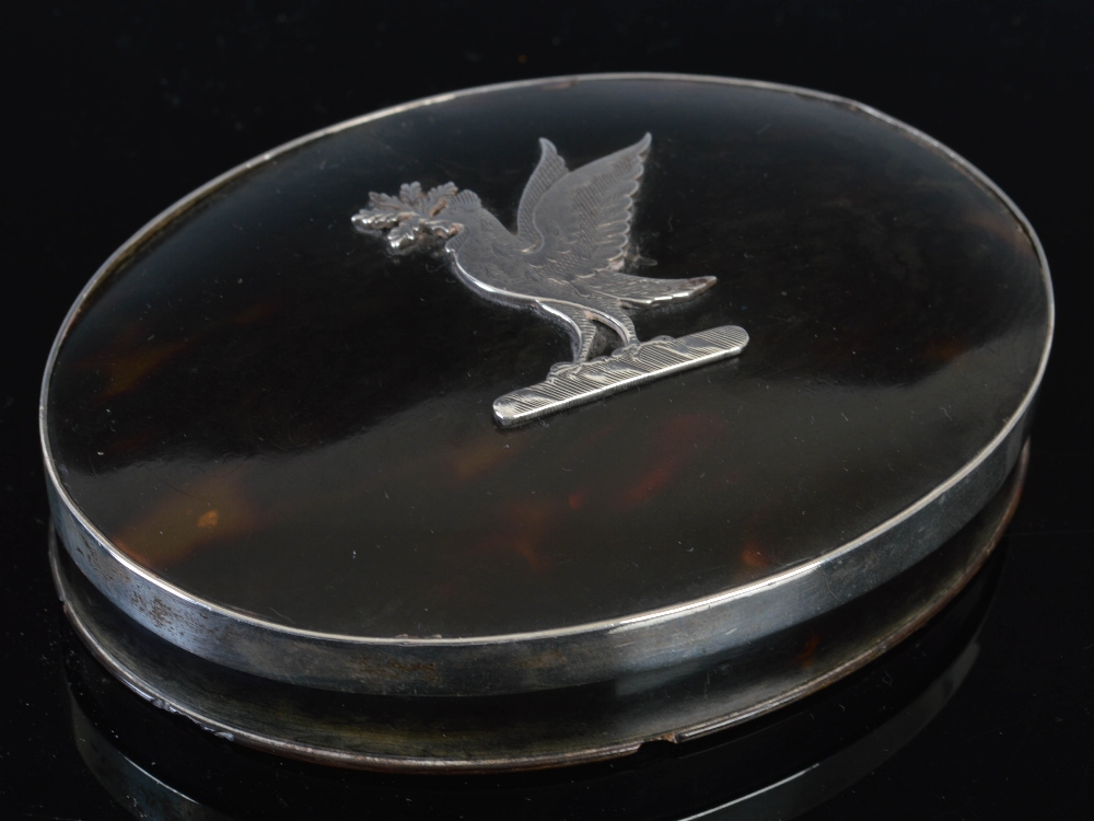 A late 18th century tortoiseshell oval snuff box, with detachable cover, plain silver rim and