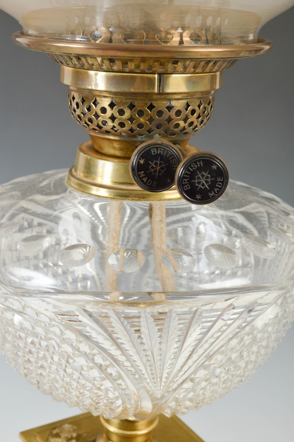 A late 19th/ early 20th century brass Corinthian column oil lamp, with frosted glass shade, the - Image 2 of 3