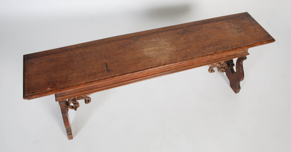 A Spanish walnut bench, probably 17th century and later, the rectangular planked top with moulded - Image 2 of 5