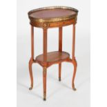 A late 19th/ early 20th century specimen wood and gilt metal mounted occasional table, the oval-