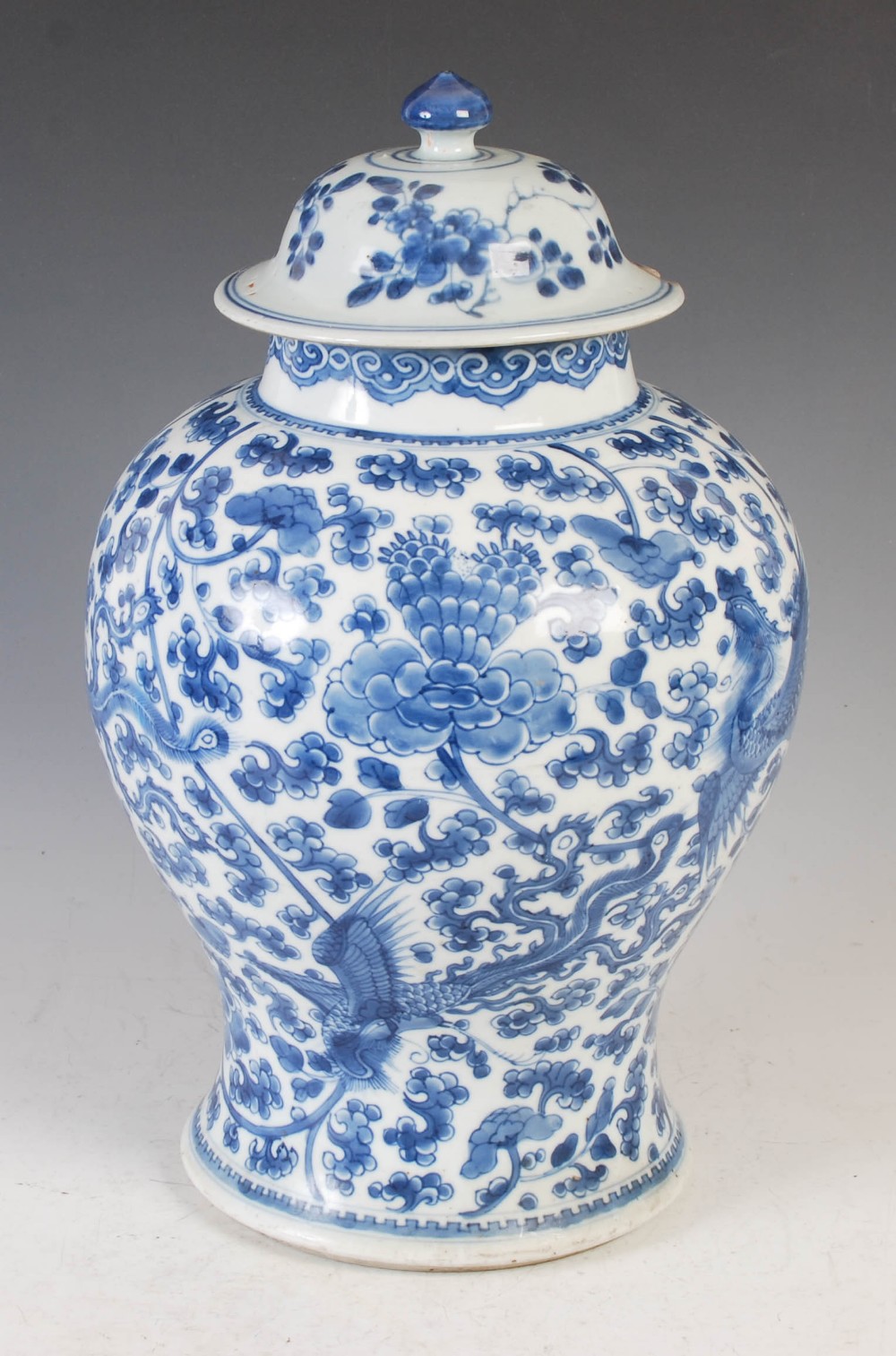 A Chinese porcelain blue and white jar and cover, Qing Dynasty, decorated with phoenix, peony and - Image 2 of 12