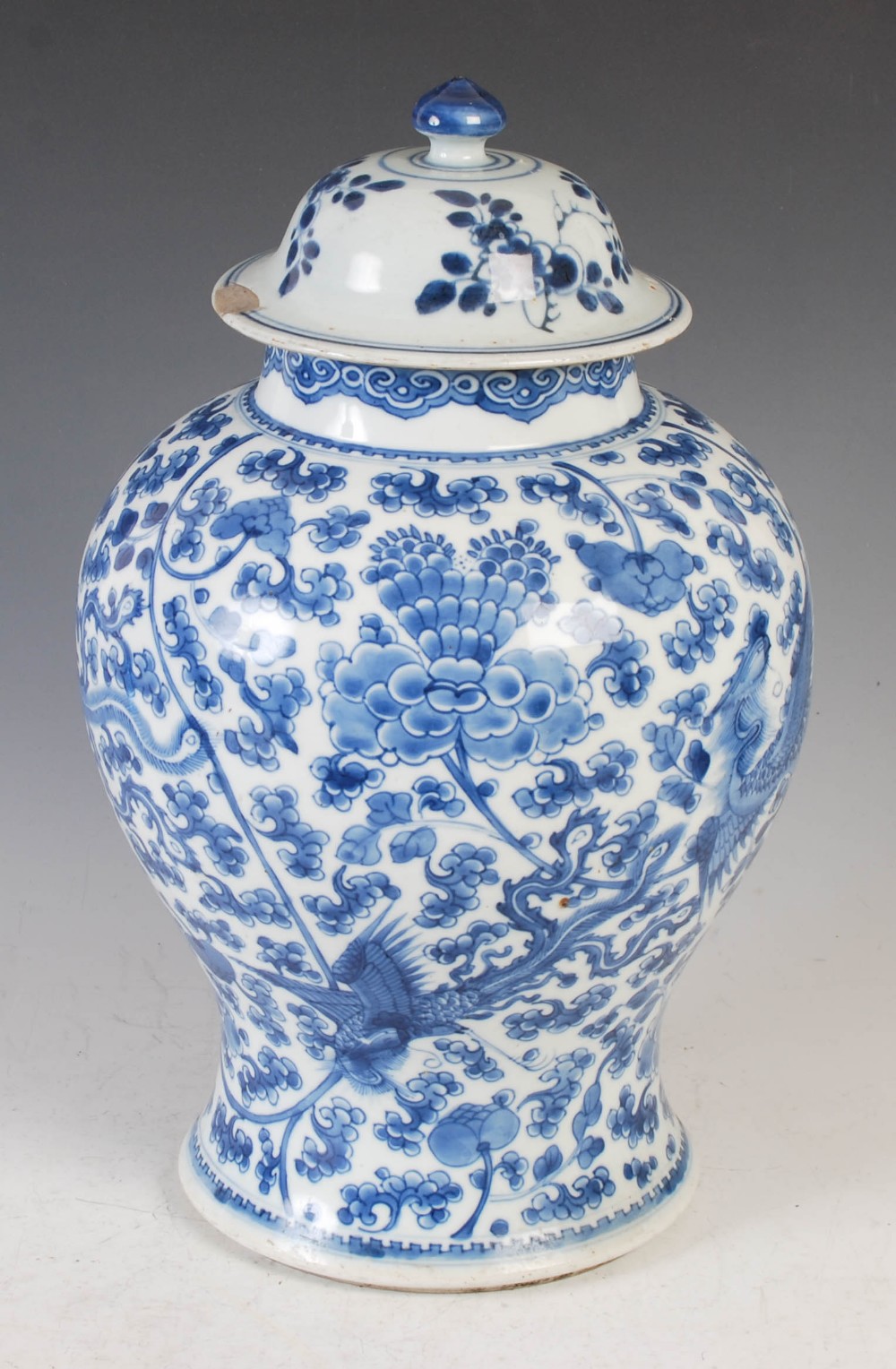 A Chinese porcelain blue and white jar and cover, Qing Dynasty, decorated with phoenix, peony and - Image 4 of 12