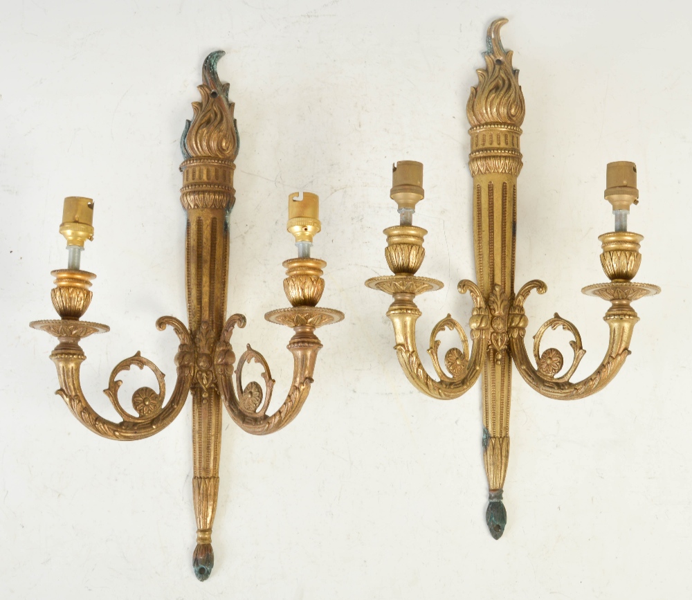 A pair of gilt metal Neoclassical style two-light wall sconces, 45.5cm long