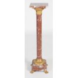 An early 20th century red and white marble gilt metal mounted urn/ jardiniere stand, the square