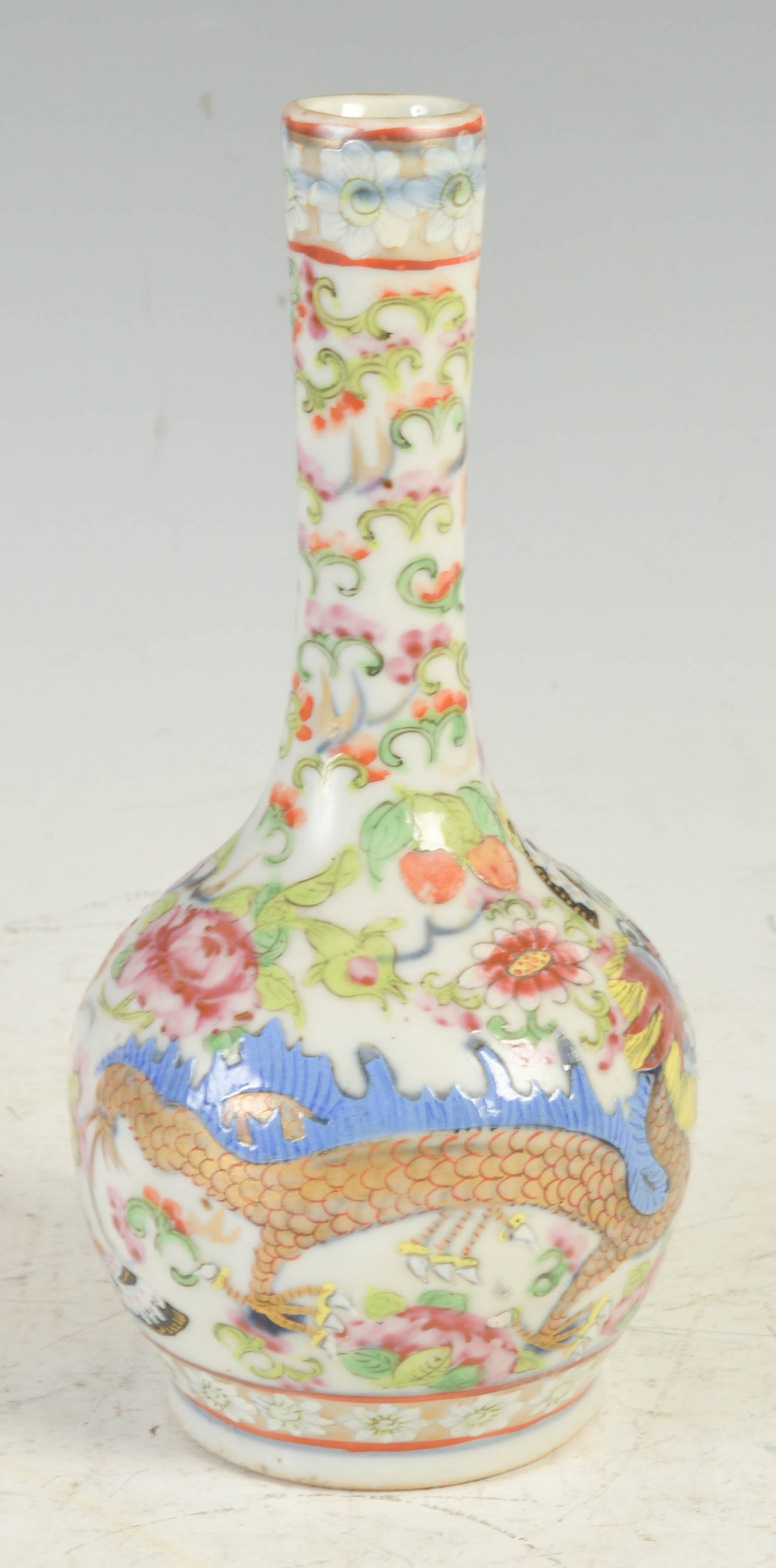 A Chinese porcelain Canton famille rose bottle vase, Qing Dynasty, decorated with a pair of - Image 4 of 5