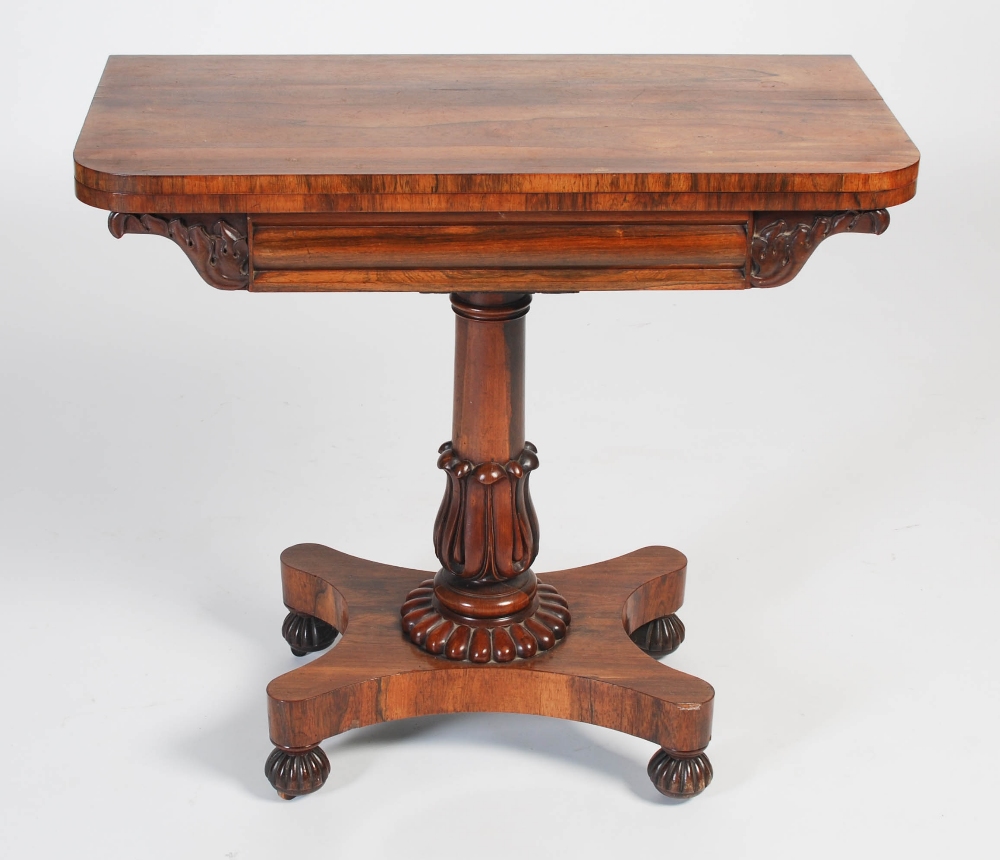 A 19th century rosewood pedestal card table, the hinged rectangular top opening to a red baize-lined