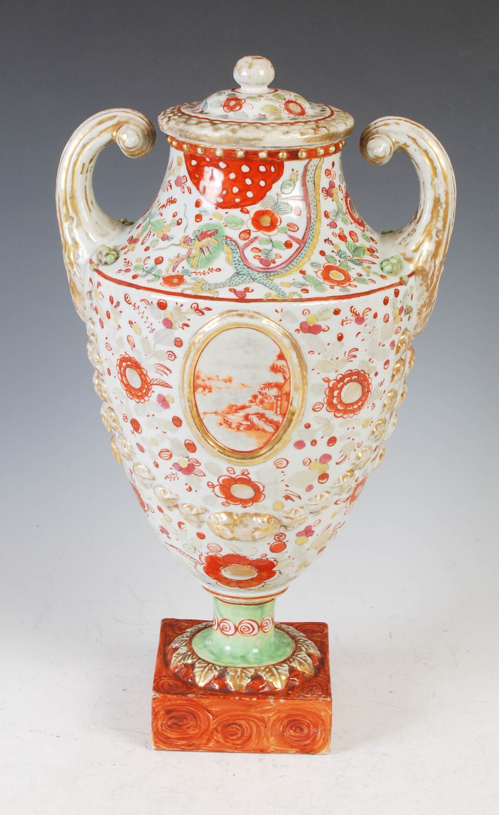 A Chinese porcelain twin-handled urn and cover, Qing Dynasty, decorated with two oval shaped - Image 3 of 10