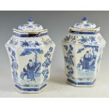 A pair of Chinese porcelain blue and white hexagonal shaped jars and covers, Qing Dynasty, decorated
