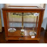 Cased scientific scales by Philip Harris Co Let