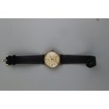 Gold men's watch with leather strap