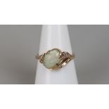 Gold opal & diamond set ring - Size P
