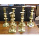 3 pairs of brass candlesticks