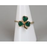 Gold emerald set clover ring - Size P