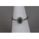 18ct white gold emerald & diamond cluster ring - Size J