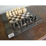 Onyx chess set on onyx board
