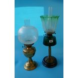 Green glass oil lamp and another