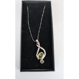 Silver necklace with a green amythst pendant