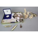 Collection of small items to include penknives, £5 coin, stone elephant etc