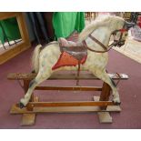 Antique J Collinson and Sons of Liverpool hand carved wooden rocking horse with original saddle