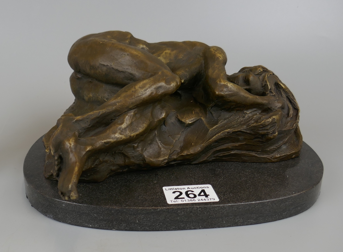 Nude bronze laid down on marble base - Approx length 26cm