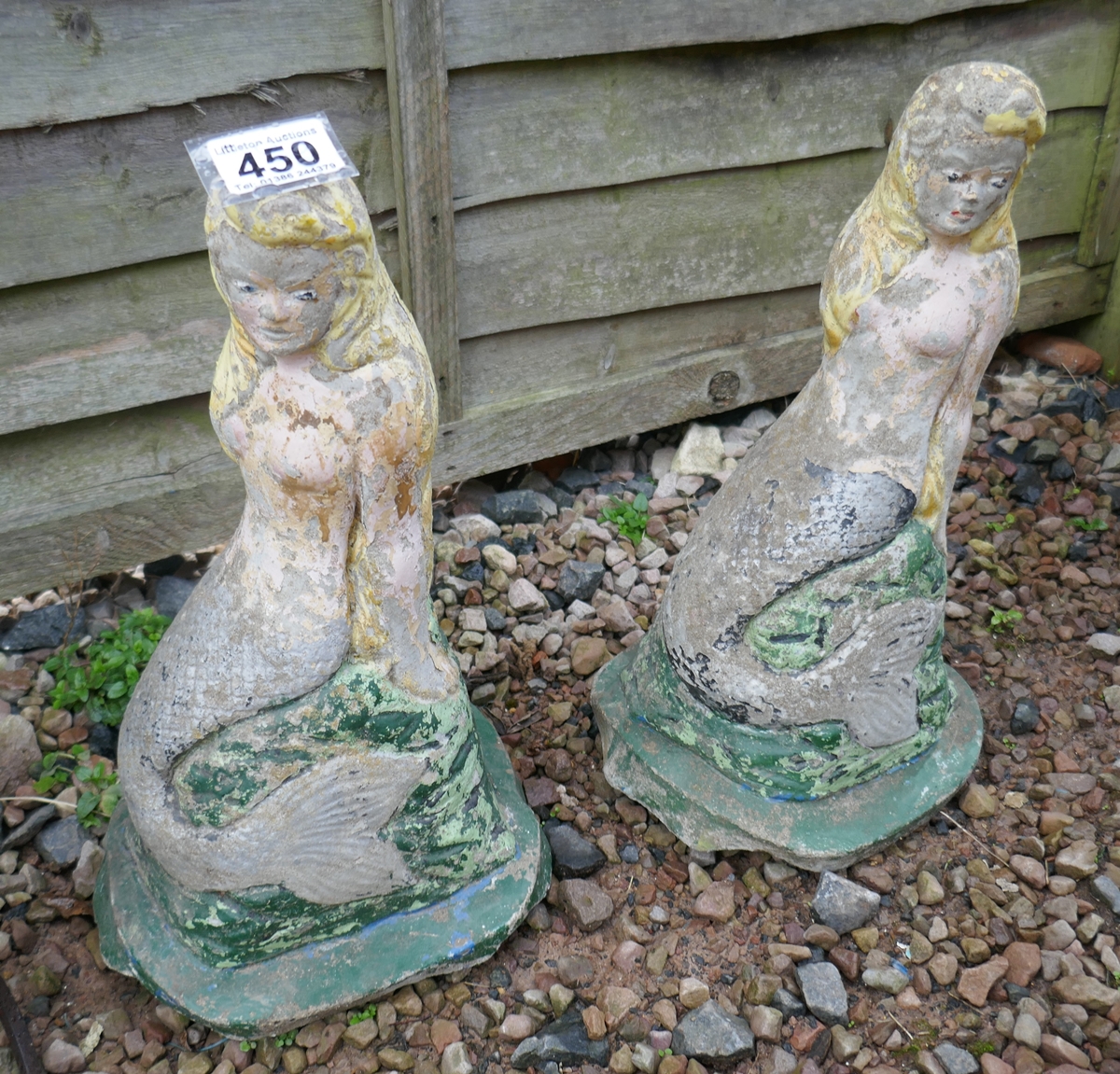 Pair of stone mermaid statues