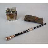 Hallmarked gold Dunhill cigarette holder and Dunhill lighter