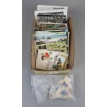 Collection of postcards, cigarette cards and loose stamps