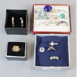 Collection of rings and a pair of earrings