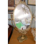 Ornate brass vanity mirror