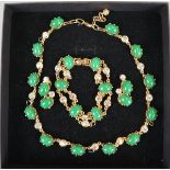 Green and gold-tone necklace with bracelet and earrings