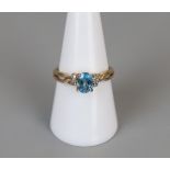 Gold blue topaz and diamond set ring - Size P