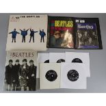 Collection of Beatles memorabilia to include book, magazines, vinyl etc.