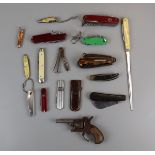 Collection of penknives along with a cap gun