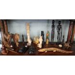 Collection of carved tribal art and wooden animals