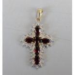 Gold diamond and garnet cross