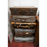 Six vintage suitcases