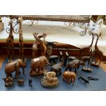 Collection of carved animal figurines etc