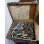 Wooden case containing spanners sockets etc